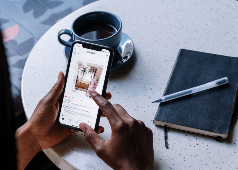A person scrolling through Instagram.