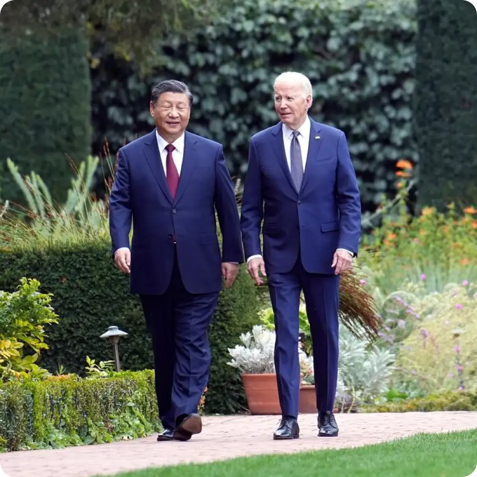 Joe Biden and an Asian world leader walking