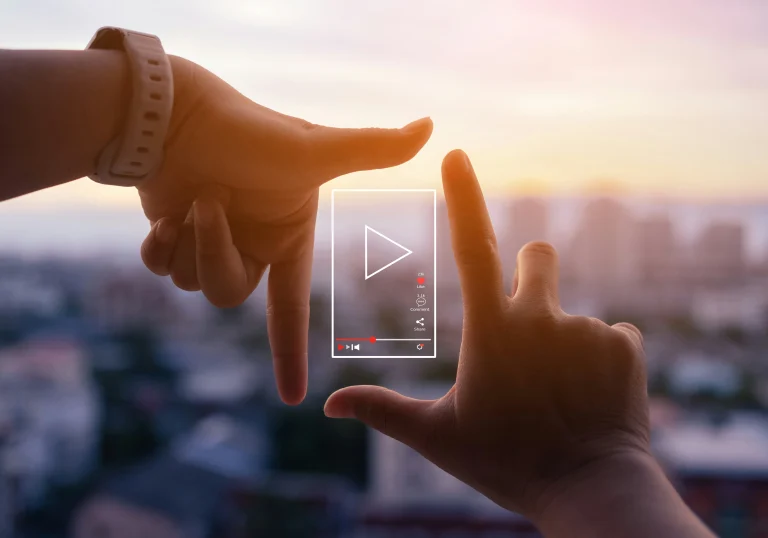 hands framing a video