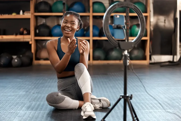 an influencer in front of a ring light camera