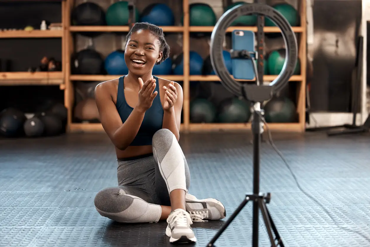 an influencer in front of a ring light camera